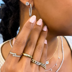 lady wrist neck wearing diamond tennis bracelets necklaces